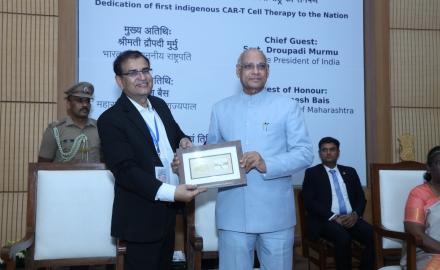 Governor of Maharashtra Ramesh Bais receiving memento